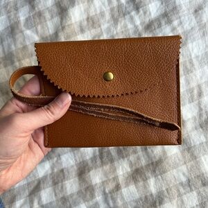 J. Crew 100% leather wristlet with brass snap